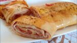 Rocambole salgado de PRESUNTO E QUEIJO com massa de PASTEL maravilhoso.